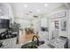 Bright kitchen featuring granite countertops, modern stainless steel appliances, and seamless layout at 213 Cannon St, Lakeland, FL 33803