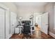 Spacious office featuring an exterior view through the bathroom and hardwood floors at 213 Cannon St, Lakeland, FL 33803