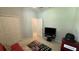 Carpeted room with closet and furnishings; suitable as a bedroom or bonus room at 2169 Rush Bay Way, Orlando, FL 32824