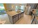 Spacious kitchen island with granite countertops, stylish cabinetry, and stainless steel appliances at 2169 Rush Bay Way, Orlando, FL 32824