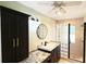 Bathroom with granite countertops and glass block shower at 2264 Palmview E Cir, Auburndale, FL 33823