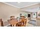Cozy dining area with table and chairs, adjacent to the living area at 236 E Seminole Ave, Lake Wales, FL 33853