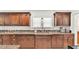 Kitchen featuring granite countertops, ample cabinet space and stainless steel faucet at 236 E Seminole Ave, Lake Wales, FL 33853