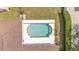 Aerial view of the pool, patio, and backyard at 2533 Peterson Rd, Lakeland, FL 33812