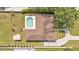 Aerial view of property, highlighting the large pool, spacious yard, and overall layout of the home and its surroundings at 2533 Peterson Rd, Lakeland, FL 33812
