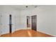 Bedroom with wood floors, ceiling fan, and closet at 2533 Peterson Rd, Lakeland, FL 33812