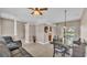 Open concept living and dining area with tiled floors at 2533 Peterson Rd, Lakeland, FL 33812