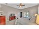 Spacious main bedroom with a view to the outdoor living space at 2533 Peterson Rd, Lakeland, FL 33812