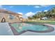 In-ground pool with a tiled edge and a well-maintained backyard at 2533 Peterson Rd, Lakeland, FL 33812