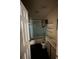Bathroom features a shower and tub combo, a white toilet, and a vanity at 2921 Galaxy Ln, Lakeland, FL 33801