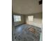 Bedroom features wood floors and dual windows at 2921 Galaxy Ln, Lakeland, FL 33801
