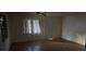 Bedroom features wood floors and a window at 2921 Galaxy Ln, Lakeland, FL 33801