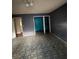 Bedroom features hard surface floors, and a neutral painted wall at 2921 Galaxy Ln, Lakeland, FL 33801