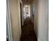 Hallway features multiple doors to the rooms at 2921 Galaxy Ln, Lakeland, FL 33801