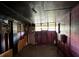 Room features wood paneling and a window at 2921 Galaxy Ln, Lakeland, FL 33801