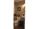 Cozy half bathroom with a pedestal sink, toilet, and stylish decor at 301 Orange Blossom Dr, Winter Haven, FL 33880