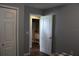 Bedroom with closet, connecting to a full bathroom at 301 Orange Blossom Dr, Winter Haven, FL 33880
