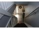 View of the home's entry from the stairs, showing the front door at 301 Orange Blossom Dr, Winter Haven, FL 33880
