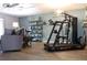 Inviting living room featuring a home gym, comfortable seating, and stylish decor at 301 Orange Blossom Dr, Winter Haven, FL 33880