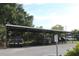 Covered parking area with parking for boats and vehicles at 301 Orange Blossom Dr, Winter Haven, FL 33880