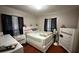Inviting bedroom featuring a comfortable bed, neutral tones, and coordinated furniture, creating a restful atmosphere at 3100 Abaco St, Orlando, FL 32827