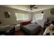 Bright bedroom with natural light, cozy decor, and ample space for relaxation, creating a comfortable retreat at 3100 Abaco St, Orlando, FL 32827