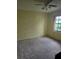 A bedroom featuring a ceiling fan and a window at 341 Sterling Dr, Winter Haven, FL 33884