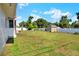 Lush backyard with a storage shed and privacy fence at 3522 Royal S Ct, Lakeland, FL 33812