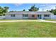 Charming single-story home with a well-maintained front lawn and inviting curb appeal at 3522 Royal S Ct, Lakeland, FL 33812
