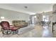 Spacious living area with tile floors, cozy seating, and an open layout at 3522 Royal S Ct, Lakeland, FL 33812