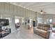 Spacious living room featuring tile floors and multiple views of the home's interior at 3522 Royal S Ct, Lakeland, FL 33812