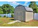Well-maintained shed with ramp and a metal roof for secure storage at 3522 Royal S Ct, Lakeland, FL 33812