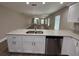 Eat-in kitchen with granite countertops, stainless steel appliances, and modern cabinets at 4042 Old Bartow Eagle Lake Rd, Bartow, FL 33830