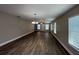 Bright living room with contemporary flooring, neutral walls, and ample natural light at 4042 Old Bartow Eagle Lake Rd, Bartow, FL 33830