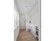 Bright closet with modern vinyl flooring and new baseboards ready for finish work at 405 S 7Th Ave, Bartow, FL 33830