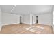 Large open living room with wood flooring, recessed lighting and open layout at 405 S 7Th Ave, Bartow, FL 33830