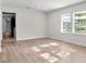 The living room is open with natural light coming through the windows at 405 S 7Th Ave, Bartow, FL 33830