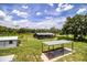 Backyard featuring covered parking, barn and utility shed at 4510 Cindy Rd, Lakeland, FL 33810
