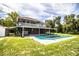 Two-story house with pool and covered patio offering great space for outdoor entertaining at 4510 Cindy Rd, Lakeland, FL 33810