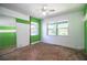 Bright bedroom with fresh paint, ceiling fan, and two large windows for ample natural light at 4510 Cindy Rd, Lakeland, FL 33810