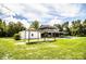 Charming two-story home with a spacious yard, a separate outbuilding and in-ground pool at 4510 Cindy Rd, Lakeland, FL 33810