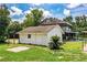 View of garage adjacent to the main house and yard at 4510 Cindy Rd, Lakeland, FL 33810