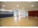 Large living room with a spiral staircase leading to the second floor, offering modern potential at 4510 Cindy Rd, Lakeland, FL 33810