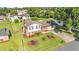 Charming two-story home featuring a well-manicured lawn and inviting landscaping, offering a warm curb appeal at 4908 Celia W Cir, Lakeland, FL 33813