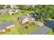 Charming two-story home featuring a well-manicured lawn and inviting landscaping, offering a warm curb appeal at 4908 Celia W Cir, Lakeland, FL 33813