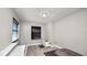 A small, tidy bedroom shows great natural light, paired with modern gray flooring and pet bed at 544 Avenue G Se, Winter Haven, FL 33880