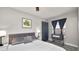 Bedroom featuring a window, tile floor, neutral decor, and minimalist design at 544 Avenue G Se, Winter Haven, FL 33880