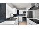 Kitchen featuring stainless steel appliances, bright white cabinets and backsplash at 544 Avenue G Se, Winter Haven, FL 33880