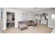 Open-concept living room featuring wood floors and modern accents at 544 Avenue G Se, Winter Haven, FL 33880