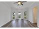 A spacious bedroom with many windows creating lots of natural light at 5722 Antler Trl, Lakeland, FL 33811
